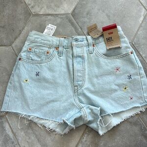 Levi 501 jean shorts with floral stitching